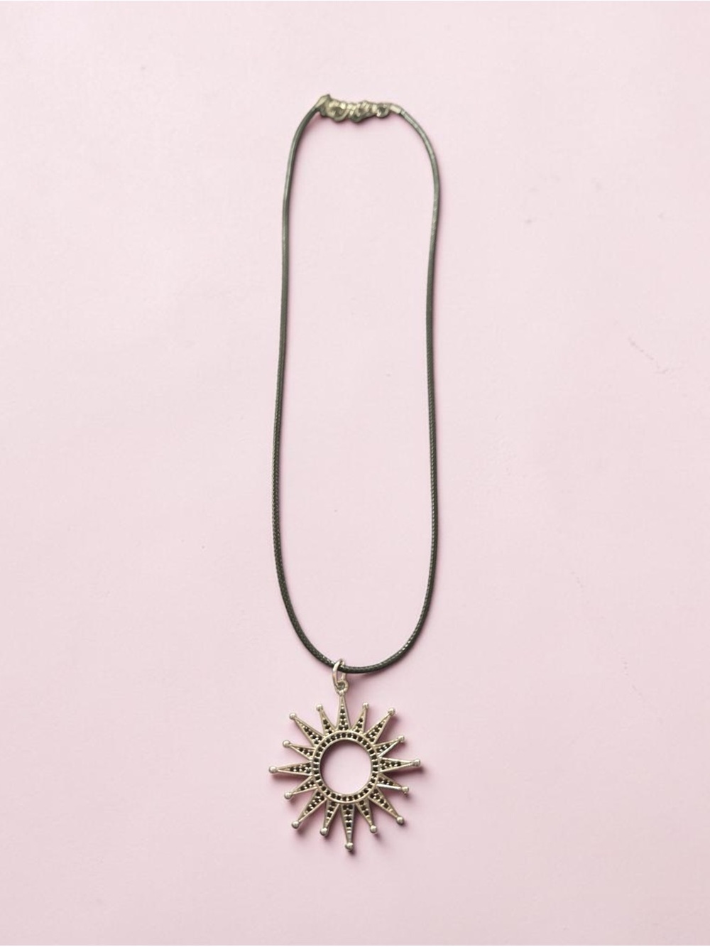 Sunburst Pendant Necklace in Silver-Tone on coated leather cord. NWOT